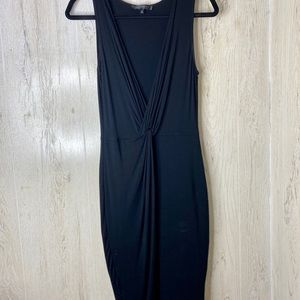 tight black bodycon sleeveless mid-length dress